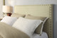 Tavel King-size Nailhead Upholstered Headboard in Tumbleweed