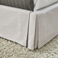 Hera Queen-Size Upholstered Skirted Storage Panel Bed in Oatmeal