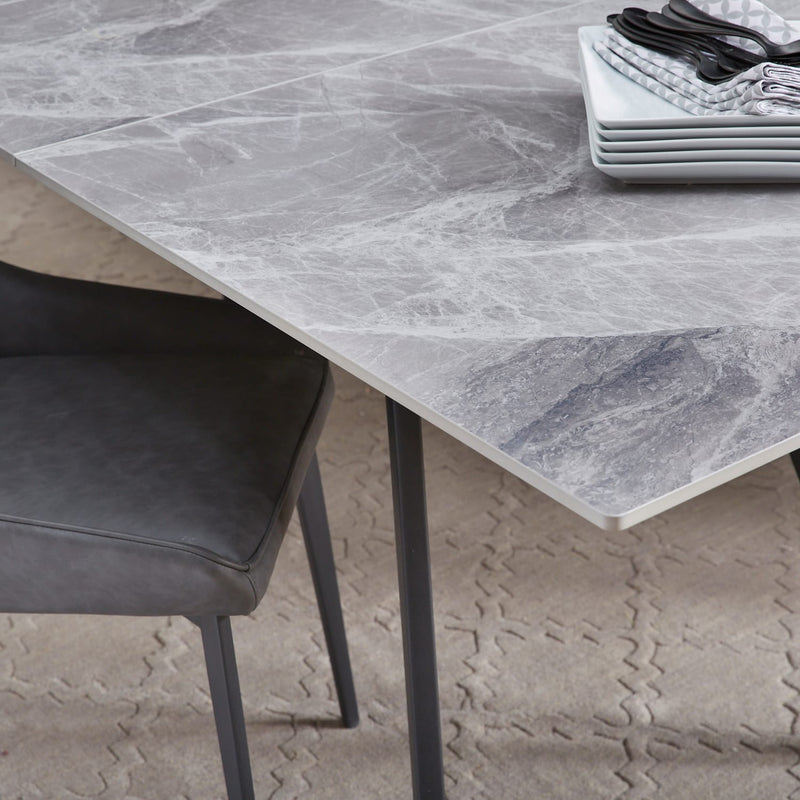 Lucia Extendable Stone Top Metal Leg Dining Table in Piedra and Black