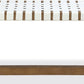 One Woven Leather and Solid Wood Dining Bench in White and Bisque