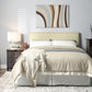 Tavel King-size Nailhead Upholstered Headboard in Tumbleweed
